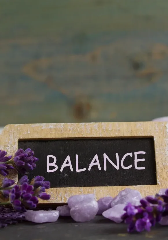Balance sign with candles and lavender